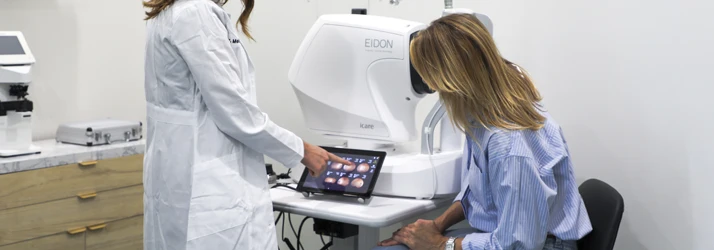 Dr. Melissa Dugan, OD uses advanced retinal imaging equipment to perform a detailed eye exam.